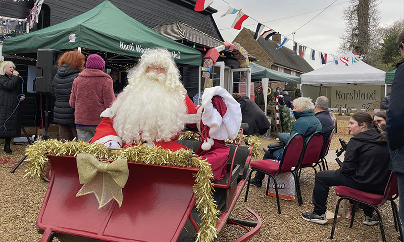 Christmas Fair 2025 19 Father Christmas Santa Sleigh North Wootton Village Market Village Hall Kings Lynn Norfolk Craft Fair Real Christmas Tree Sale